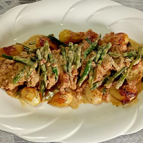 Surita se geurige varkfilet in ŉ mosterd-roomsous